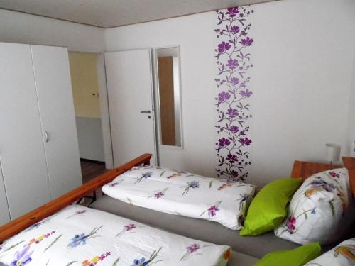 Postel nebo postele na pokoji v ubytování Ferienhaus zur schönen Aussicht