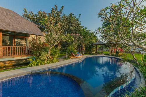 Kolam renang di atau di dekat Villa D'Carik Bali