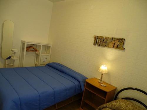 Posteľ alebo postele v izbe v ubytovaní Casa Papapietro