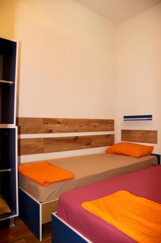 Llit o llits en una habitació de Dani-Ban