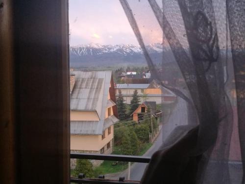 a view from a window of a building with a mountain at Dom Wypoczynkowy u Ewy in Biały Dunajec