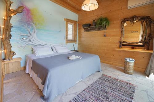 Posteľ alebo postele v izbe v ubytovaní Driftwood Villa