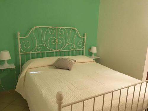 Una cama o camas en una habitación de Traiano Suite