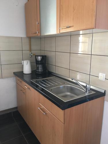 Η κουζίνα ή μικρή κουζίνα στο Apartment Sena