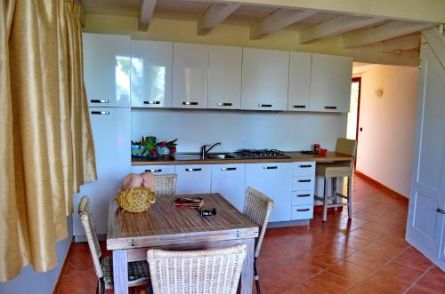 Η κουζίνα ή μικρή κουζίνα στο Porto Antigo Hotel BB