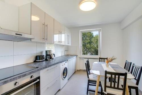 Η κουζίνα ή μικρή κουζίνα στο Stay Here ND Apartments