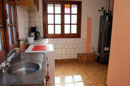 Η κουζίνα ή μικρή κουζίνα στο Laguna Esmeralda B&B