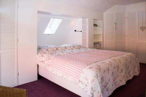 En eller flere senge i et værelse på Beleef het Noorden