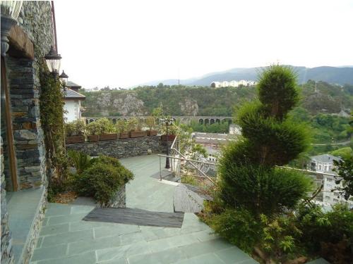 a view of a patio from a building at Casona El Gurugu in Luarca