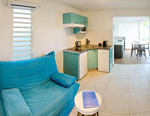 Kuchyň nebo kuchyňský kout v ubytování Majesty Palm Hôtel