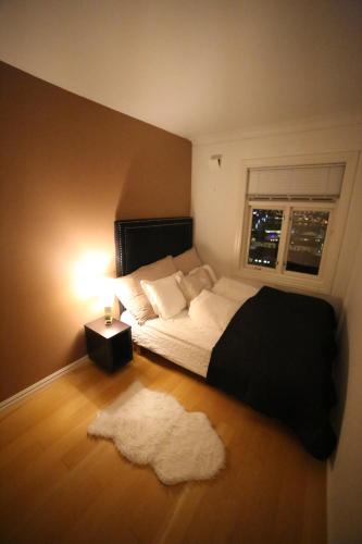 Katil atau katil-katil dalam bilik di BraMy Apartments The LUX View