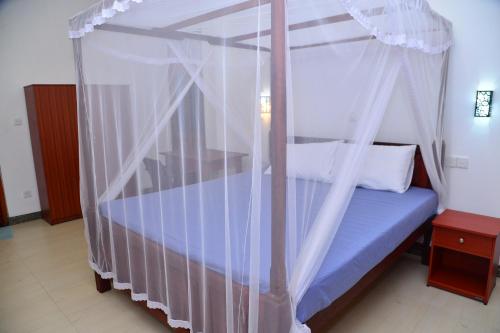 Katil atau katil-katil dalam bilik di Villa Wanderlust