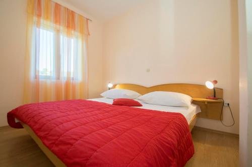 Postel nebo postele na pokoji v ubytování Holiday Home Pelegrin