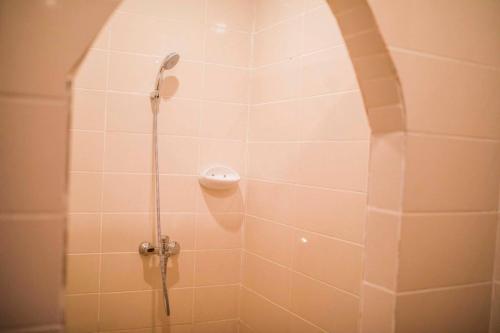 a shower with a shower head in a bathroom at VRclub Paje Palms Beach Resort in Paje