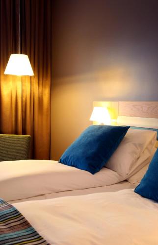 Postel nebo postele na pokoji v ubytování Thon Hotel Brønnøysund
