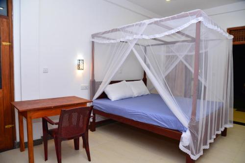 Katil atau katil-katil dalam bilik di Villa Wanderlust