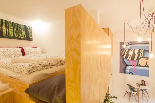 Postel nebo postele na pokoji v ubytování Ruterra Studio with Private Terrace