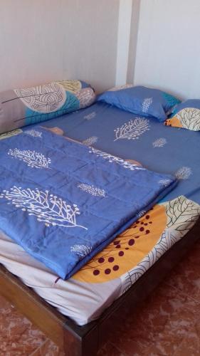 Кровать или кровати в номере Happy Homestay