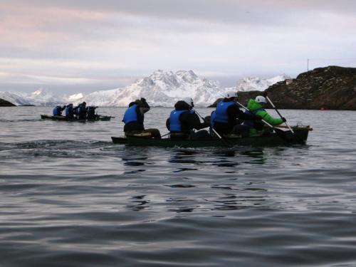 a group of people in a boat in the water at Thon Hotel Lofoten in Svolvær