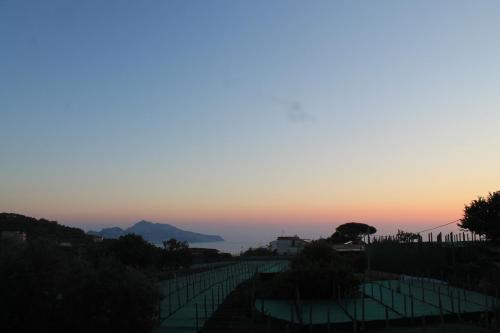 a view of the sunset from the top of a hill at Sunset House in Massa Lubrense