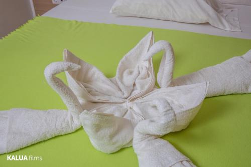 Postel nebo postele na pokoji v ubytování Hotel Cesaria