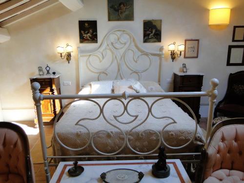 Ένα ή περισσότερα κρεβάτια σε δωμάτιο στο Casa Carmignano