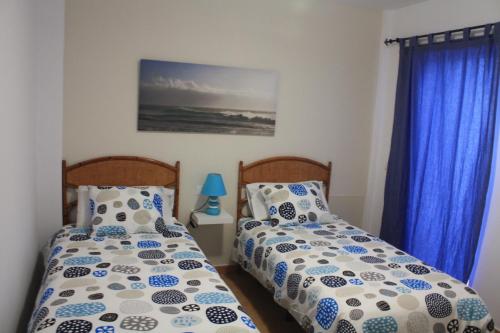 A bed or beds in a room at mirador del roque 2