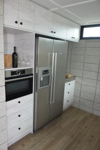 Kuchyň nebo kuchyňský kout v ubytování 157 Field Way Luxury Lodge