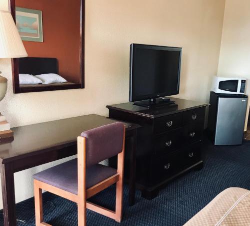 Kuchyň nebo kuchyňský kout v ubytování Executive Inn Texarkana