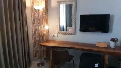 Μια τηλεόραση ή/και κέντρο ψυχαγωγίας στο Studio28 at Clove Garden
