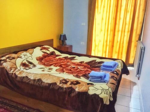 Een bed of bedden in een kamer bij Faraya Residencia