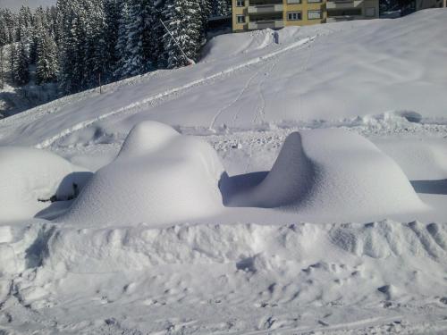 a pile of snow on a snow covered slope at Apartments Bergblick in Sonnenalpe Nassfeld