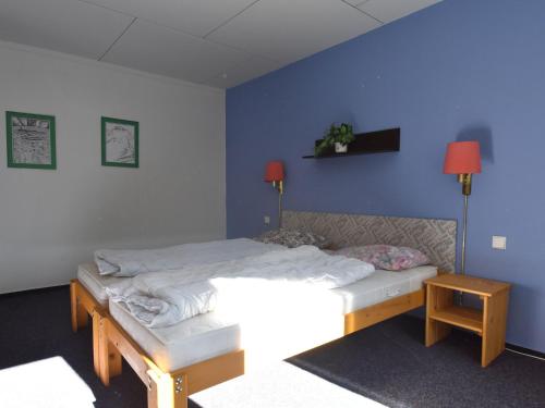 Chalet in Dolní Brusnice near Ski Liftにあるベッド