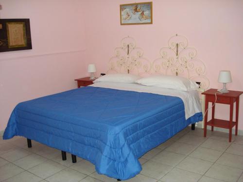 Giường trong phòng chung tại Casa Vacanze Lillo
