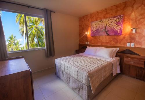 Village Paraíso Tropical — Garden view