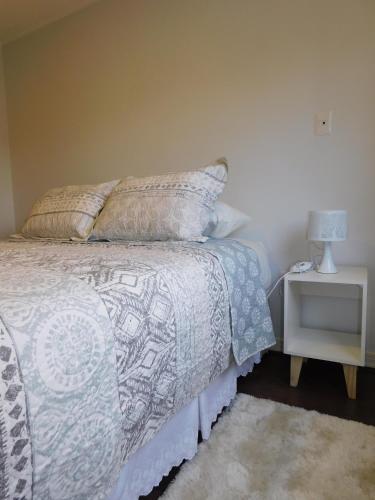 Una cama o camas en una habitación de Los Magnolios