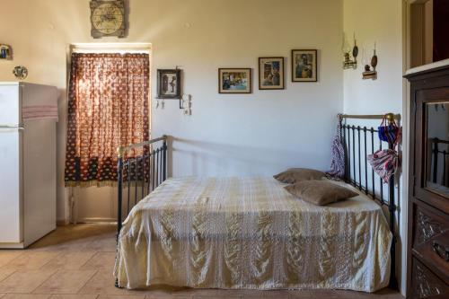 Ένα ή περισσότερα κρεβάτια σε δωμάτιο στο The Olive House