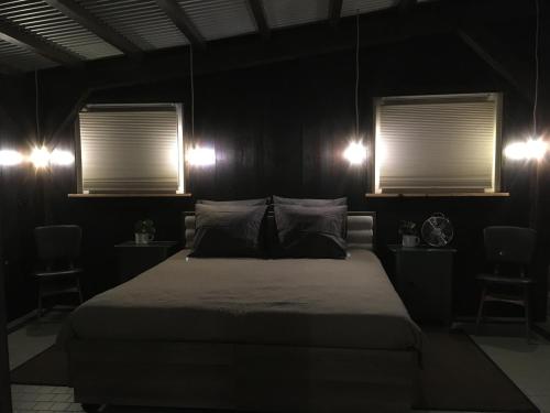 Llit o llits en una habitació de Boerderij Honswijck