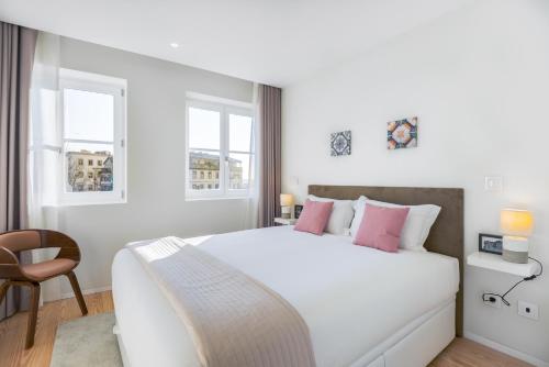 Ένα ή περισσότερα κρεβάτια σε δωμάτιο στο Blue House Porto Apartments - Parking