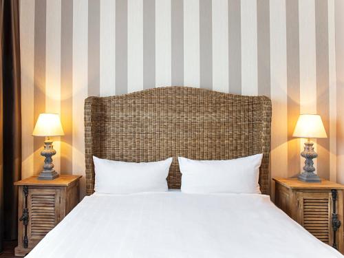 Katil atau katil-katil dalam bilik di Victor's Residenz-Hotel Saarlouis