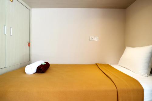 Postel nebo postele na pokoji v ubytování Taste of Bali Hostel