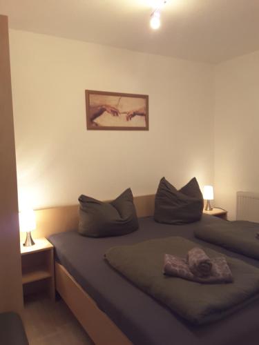 Ein Bett oder Betten in einem Zimmer der Unterkunft Strandidyll