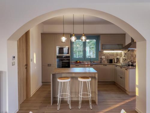 Dapur atau dapur kecil di Exclusive Sea View Villa Madelaine