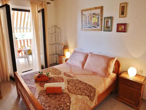 a bedroom with a large bed in a room at Studio Sea in Rovinj