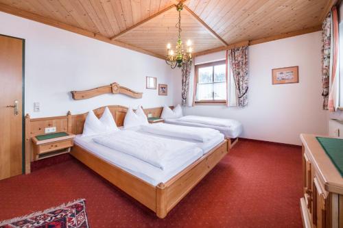 Postel nebo postele na pokoji v ubytování Haus am Platz - Weitgasser