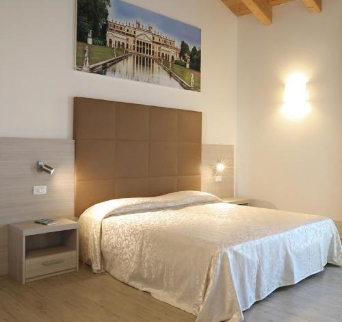 Posteľ alebo postele v izbe v ubytovaní Agriturismo Corte Foscara