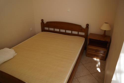 Katil atau katil-katil dalam bilik di Beachfront Apartment