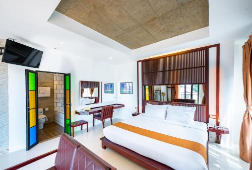 Un pat sau paturi într-o cameră la S Park Design Hotel