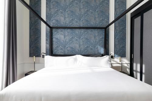 Maldà Singular Hotelにあるベッド