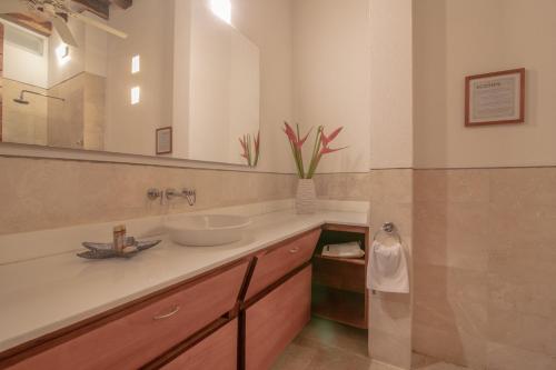 Ванна кімната в Casa Claver Loft Boutique Hotel